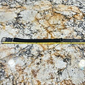 LEAVING CLOSET! 
Nike baseball belt. Adult/Mens OSFM. adjustable. Black. Used